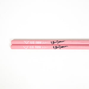 ET signature autographed pink vater drumsticks close up ends Elise Trouw